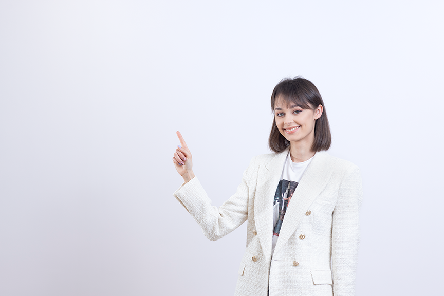 a female student in a white jacket