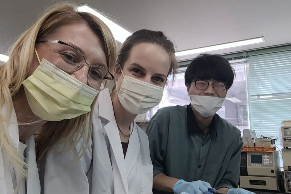 Researchers wearing face-masks in a laboratory