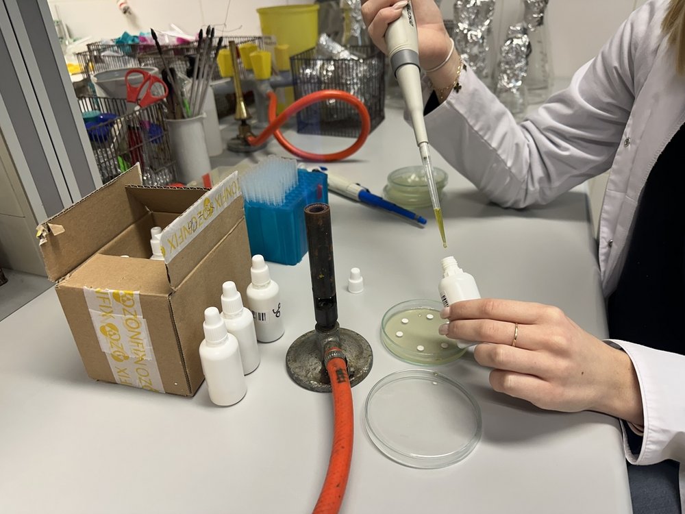  a female student working in a laboratory