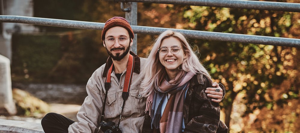 A smiling boy and a girl