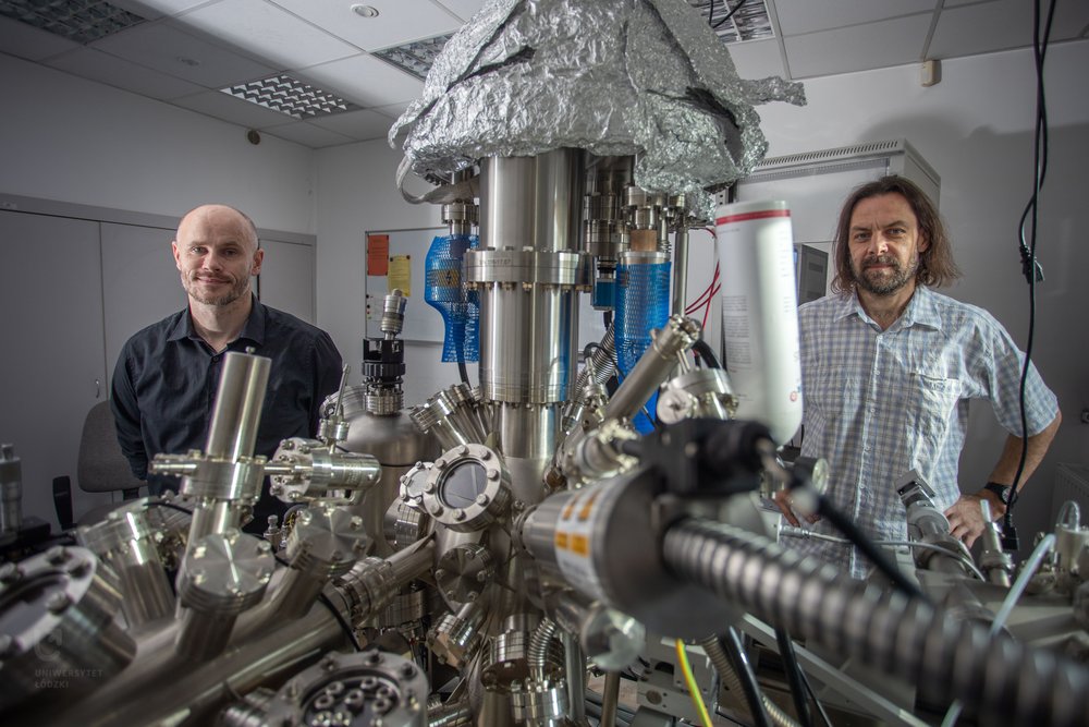 physicists in the laboratory