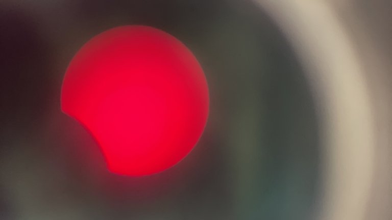 solar eclipse as seen through a telescope