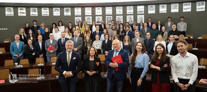  a group of people in an academic hall - 25th Anniversary of the UniLodz Law Clinic