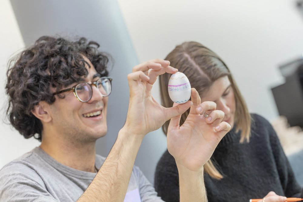a student during dyeing eggs
