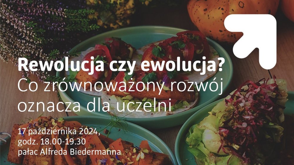 A photo depicting a table with food, with vegetables in the foreground and details of the event