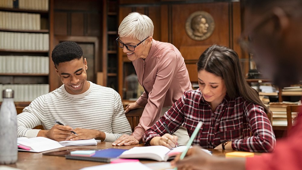 a decorative element: an academic teacher conducting classes with students