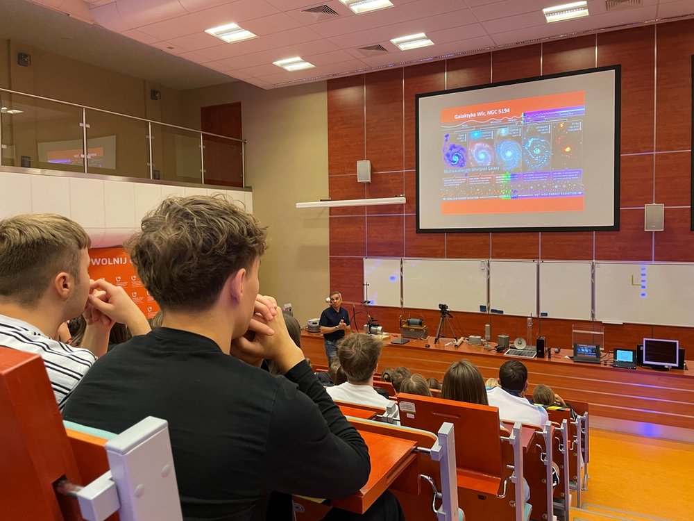 the assembly hall with participants and a speaker