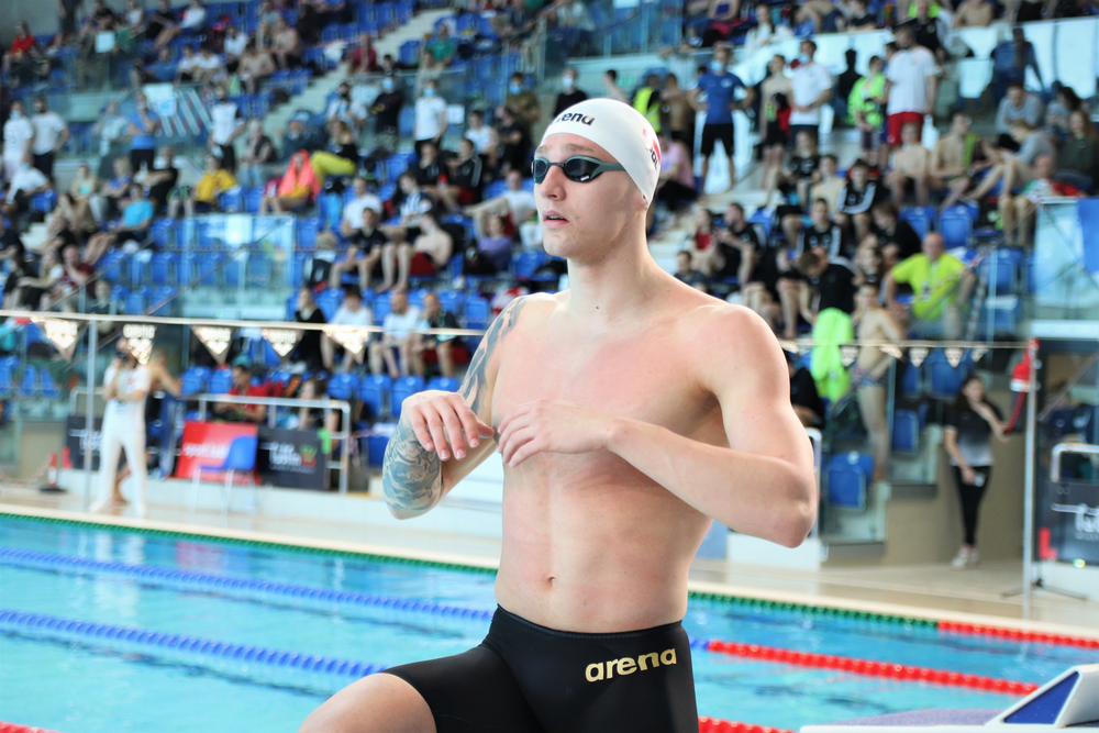 Jakub Kraska in a swimming suit at the swimming pool during the Polish Academic Championships in swimming