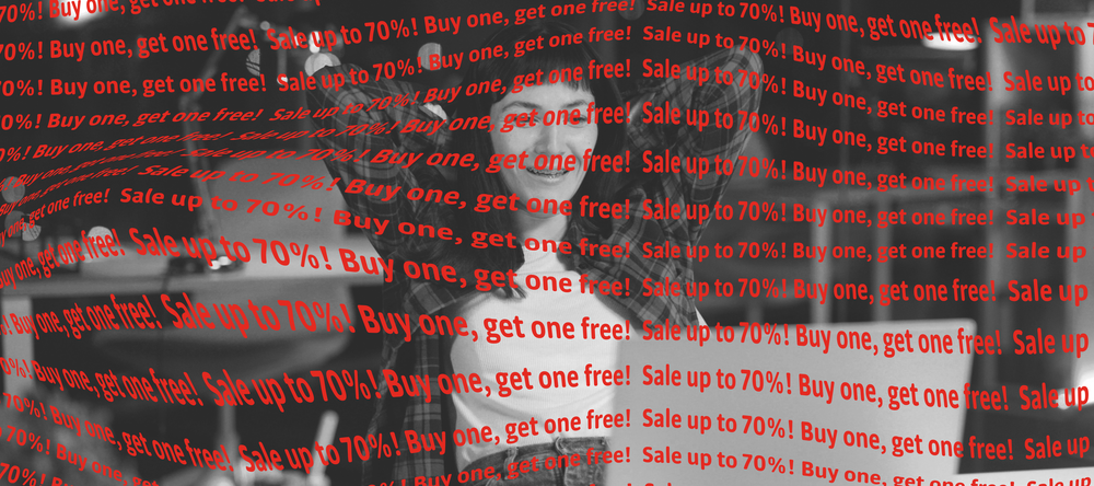 a graphics related to Black Friday: a woman in from of a computer screen and red inscriptions