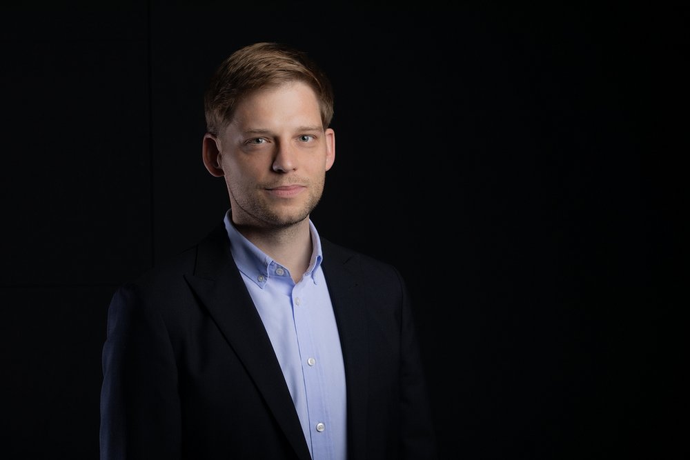 a portrait photo of Prof. Mikołaj Deckert