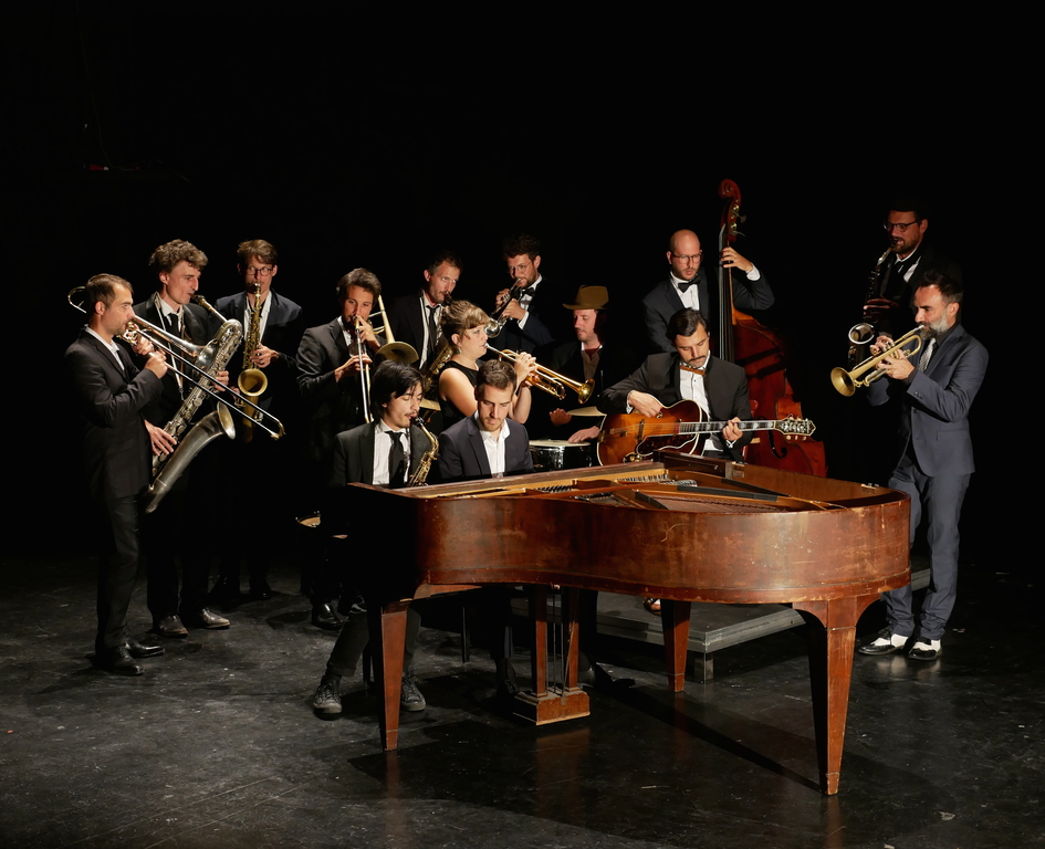 Jazz band - a group of men in suits playing instruments