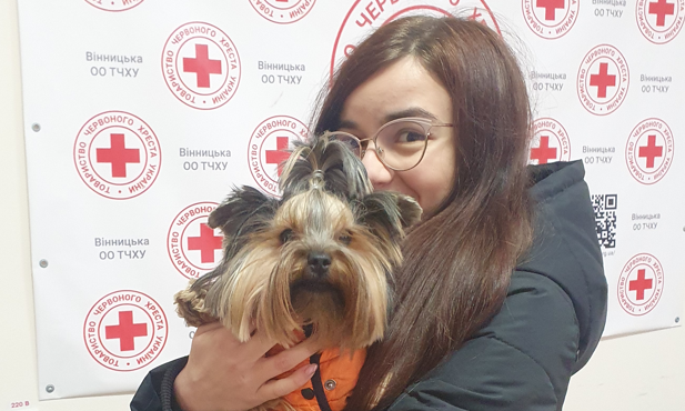 A young woman with a dog