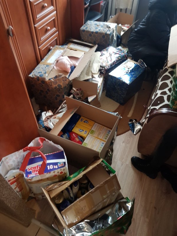 Unwrapped gift boxes at the family's home